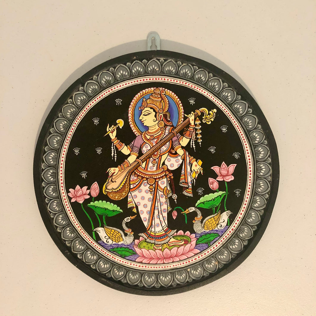 Handcrafted Natural Solid Wood Wall Hanging Plate for home decor, wedding, housewarming gifts of Goddess Saraswati in Pattachitra Wood Art